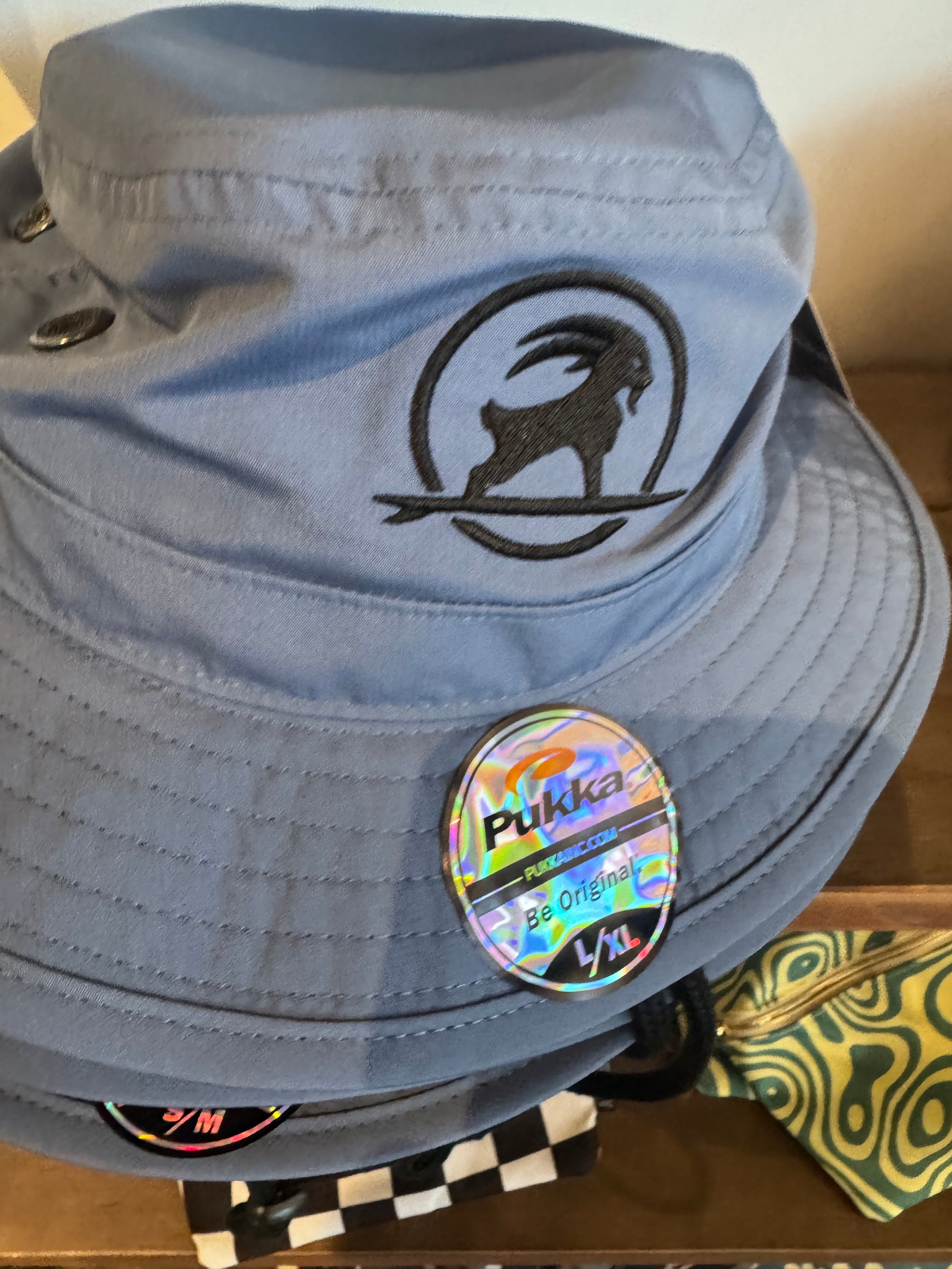 SURFGOAT Logo BUCKET. SPF UPF 50