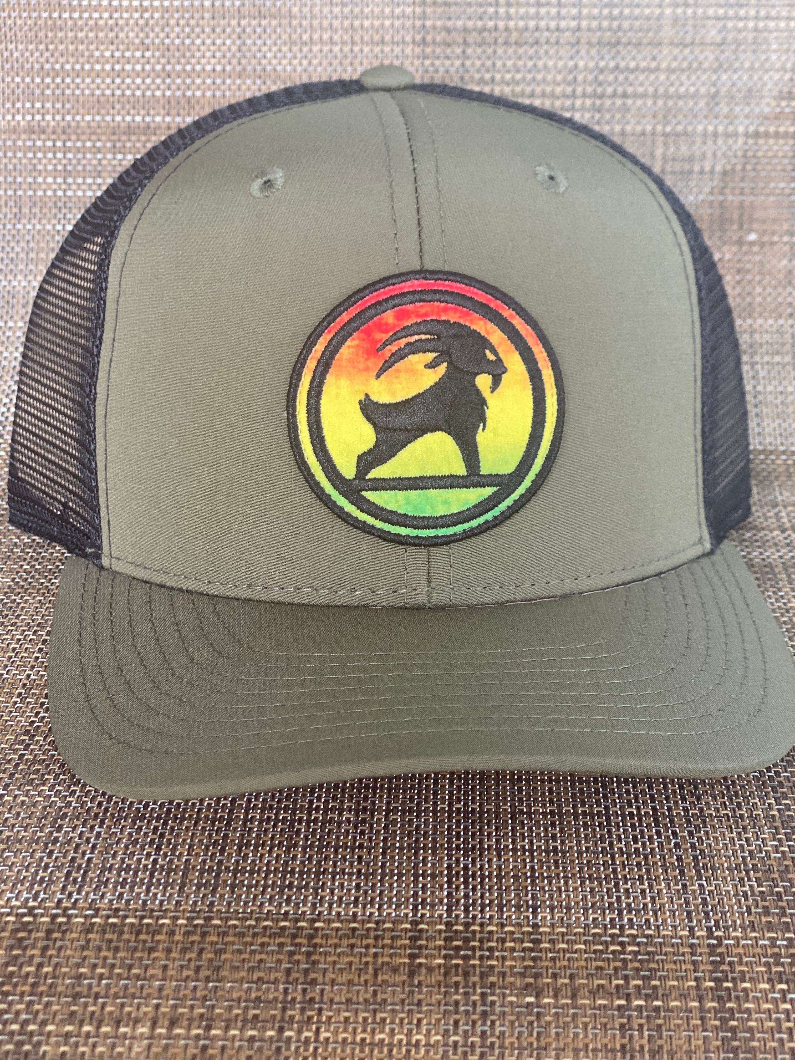 SURFGOAT “KING” -SPF 50 UV TRUCKER Hat (Rasta/Mixed)