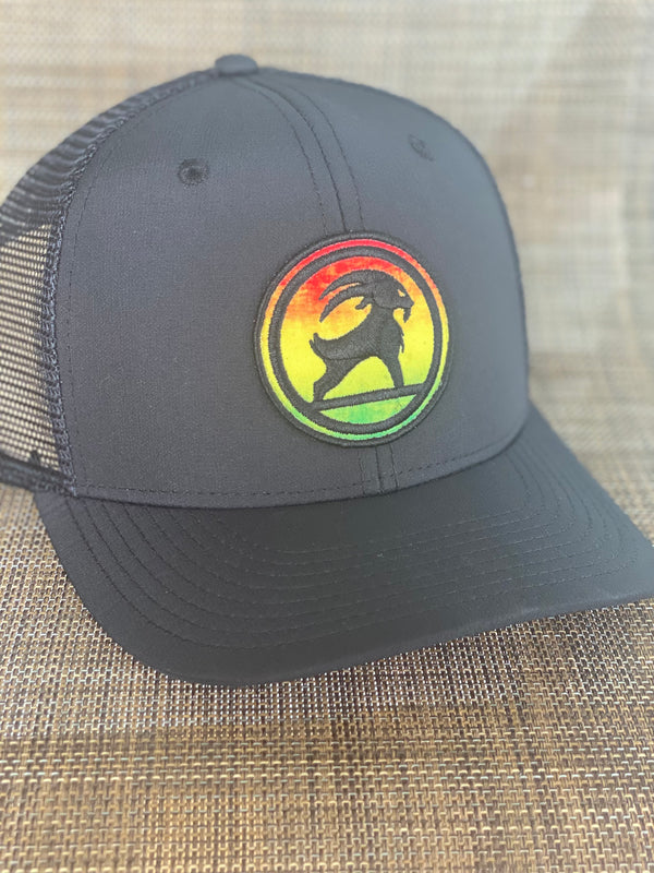 SURFGOAT “KING” -SPF 50 UV TRUCKER Hat (Rasta/Mixed)